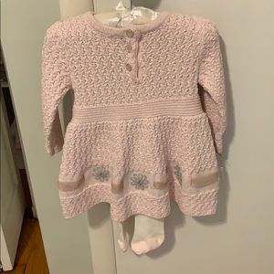 Pink sweater dress and tights